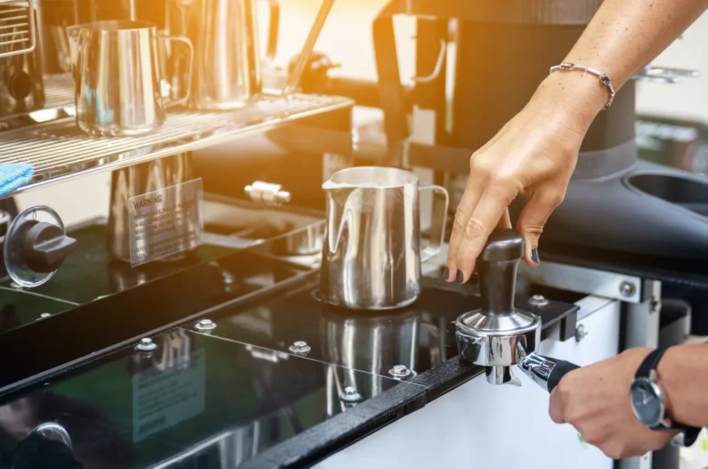 Barista preparing espresso coffee at a Brisbane event